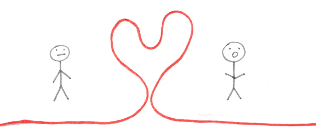 Two gray stick figures stand apart with a red string forming a heart between them, showing connection or love between people.